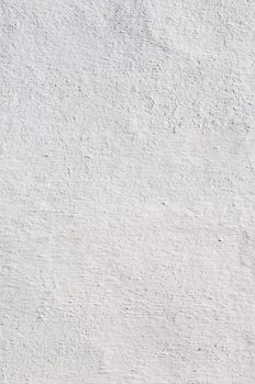 Detail of a rugged white wall suitable as background