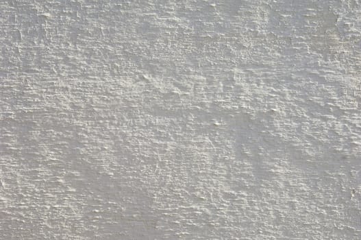 Detail of a rugged white wall suitable as background