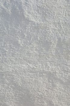 Detail of a rugged white wall suitable as background