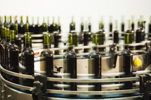 Turntable of a bottle filling line at a modern winery  