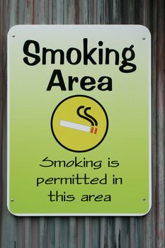 A Smoking permitted in this area sign