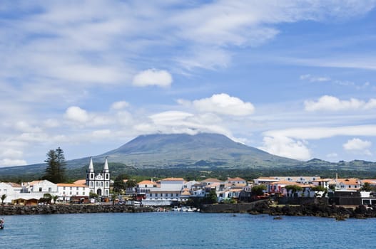 View from the sea of the village of Madalena in Pico island, Azores