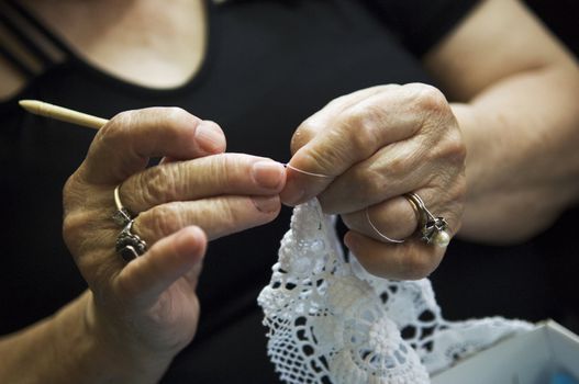 Embroiderer working. Pico island, Azores, Portugal