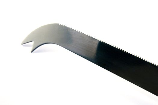 Chrome cheese knife with serrated edge on a white background