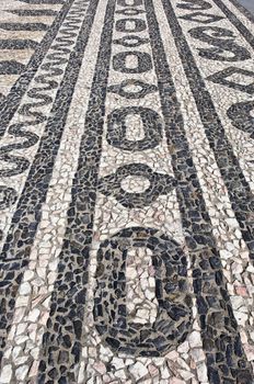 Nice geometric decorative stone pavement traditional from Portugal
