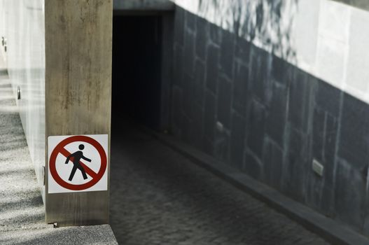 Forbidden to pedestrians, sign in the entrance of an underground car parking 
