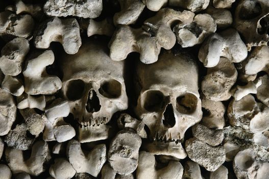 Human skulls covering the walls of the Bones Chapel, Evora, Portugal
