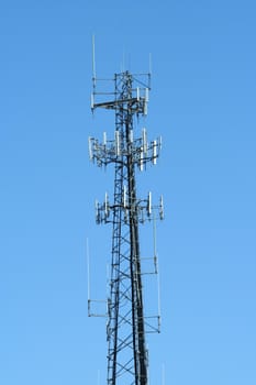 A Antenna radio tower against blue sky