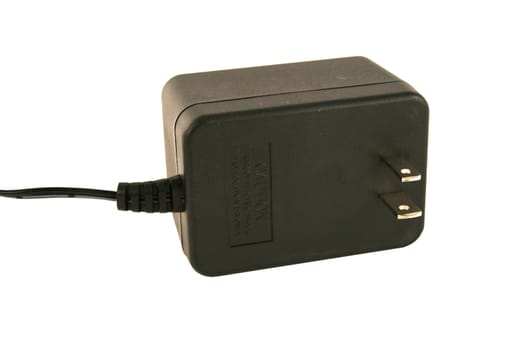 A Isolated AC adaptor plug on white