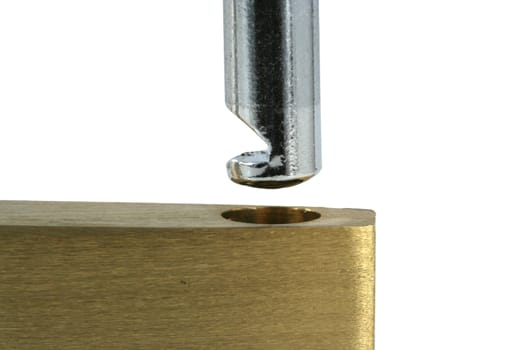 A Isolated Brass open lock on white macro