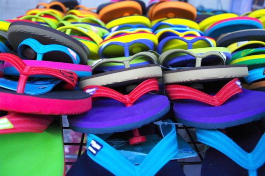 rows of brightly colored flipflops