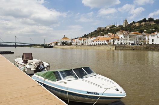 View of the historic town of Alcacer do Sal and the river Sado, Alentejo, Portugal
