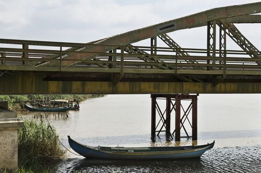 Iron drawbridge detail over the river Sado, Alcacer do Sal, Alentejo, Portugal
