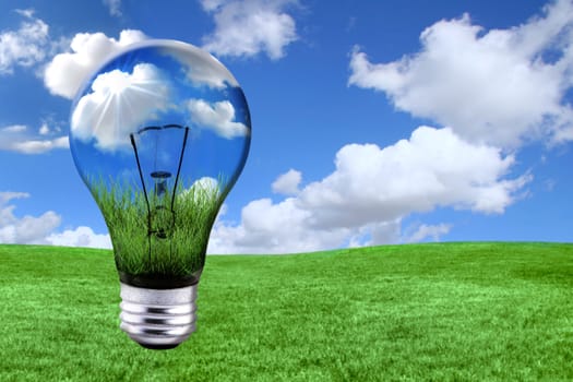 Global Concept of Green Energy Solutions With Light bulb and Planet on Bright Landscape