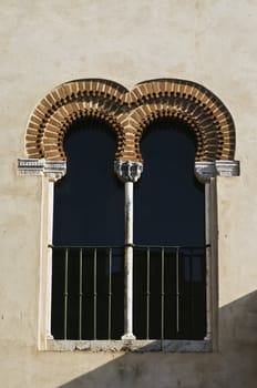 Moorish window in the medieval castle of Alvito, Alentejo, Portugal
