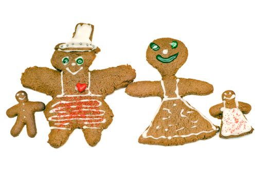 A gingerbread family isolated against a white background