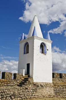 Belfry over the medieval walls of the castle of Arraiolos, Alentejo, Portugal
