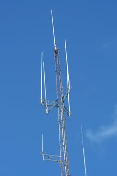 A Radio Antenna against a blue sky