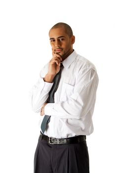 Handsome African Hispanic business man in white shirt, gray pants and tie, standing with hands on chin thinking, isolated