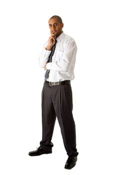 Handsome African Hispanic business man in white shirt, gray pants and tie, standing with hands on chin thinking, isolated