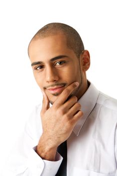 Torso of a handsome African Hispanic business man in white shirt and gray tie with hand on chin and thinking, isolated