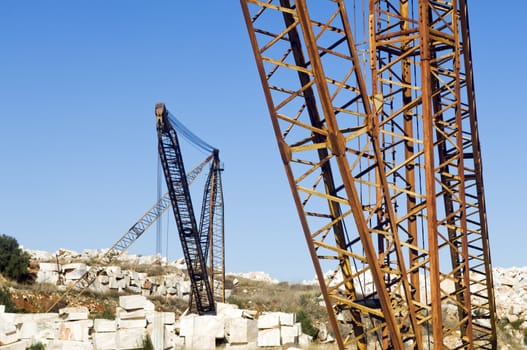 Cranes and marble blocks at a quarry near Vila Vi�osa, Alentejo, Portugal