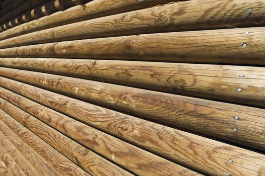 Perspective detail of the exterior of a log wall
