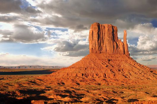 Monument Valley Buttes With Clouds at Sundown