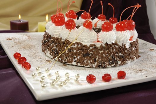cream cake, decorated the red sweet cherry