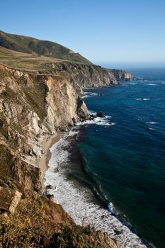 Big Sur is a sparsely populated region of the central California  coast where the Santa Lucia Mountains rise abruptly from the Pacific Ocean.