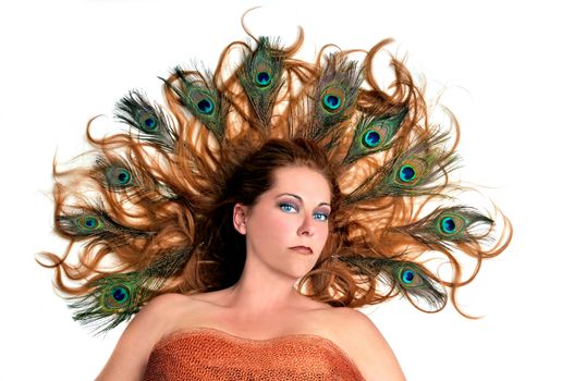 Autumn Fairy Concept - Redhead With Peacock Feathers in Her Hair on White Background