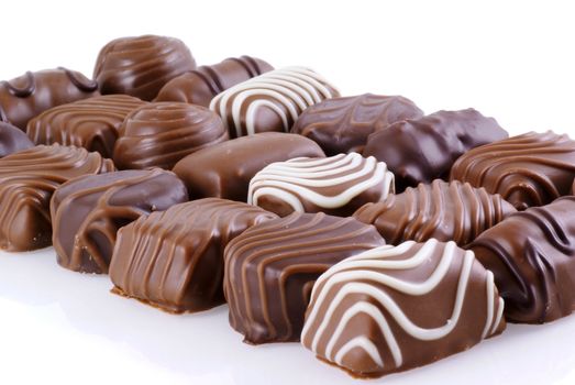 Belgian chocolates isolated on a white background.            