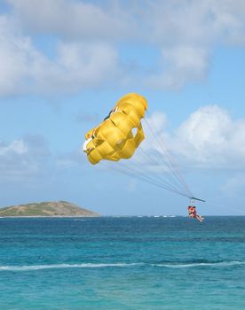 A view of parasailing in the Caribbean, just off the island of St. Maarten on a beautiful afternoon in January