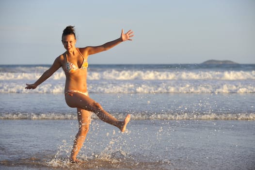 Pretty woman enjoying the beach in Buzios, Brazil