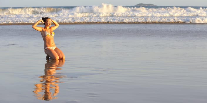 Pretty woman enjoying the beach in Buzios, Brazil