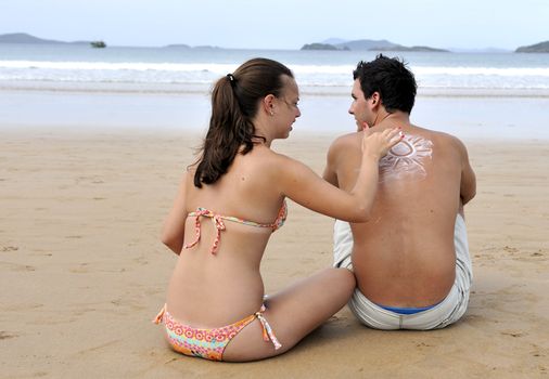 Loving couple having fun on the beach
