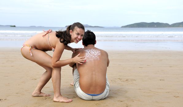 Loving couple having fun on the beach
