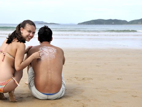 Loving couple having fun on the beach
