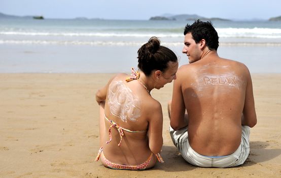 Loving couple having fun on the beach
