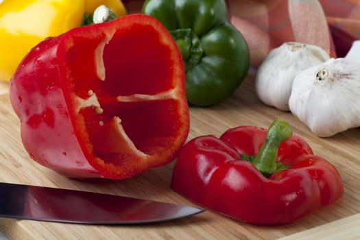 Red bell pepper with top removed ready for making stuffed peppers.