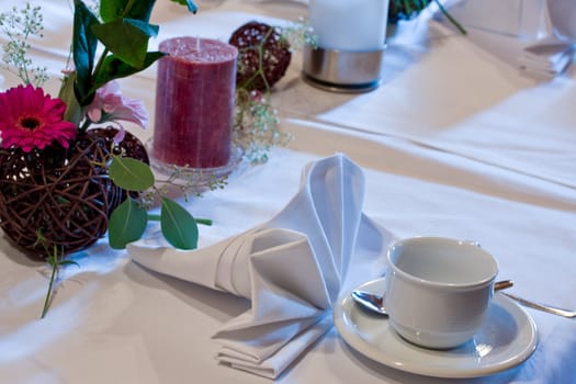 empty coffee cup on a decorated table