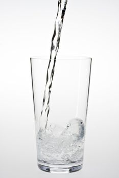 water splashing in a drinking glass