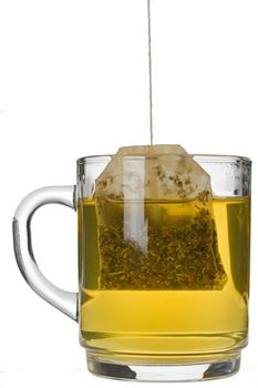 glass of herbal tea isolated on white