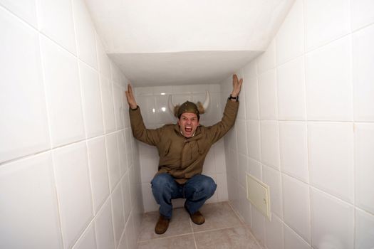 crazy man trapped in a corner