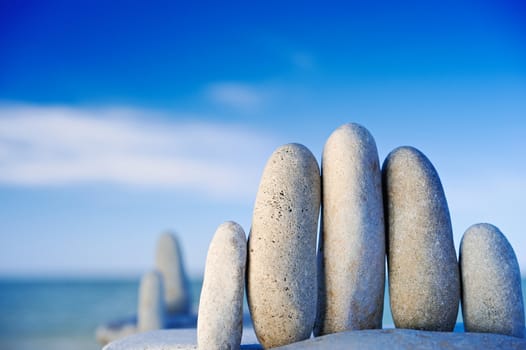 Elongated white gravel on the sea shore