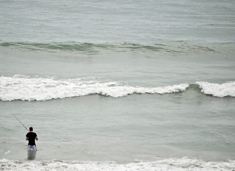 Fishing in the waves