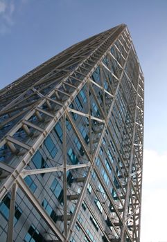 perspective of a modern skyscraper, blue glass building