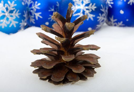 close-up pine cone and christmas decorations, isolated on white