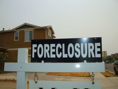 Close up of a foreclosure sign.