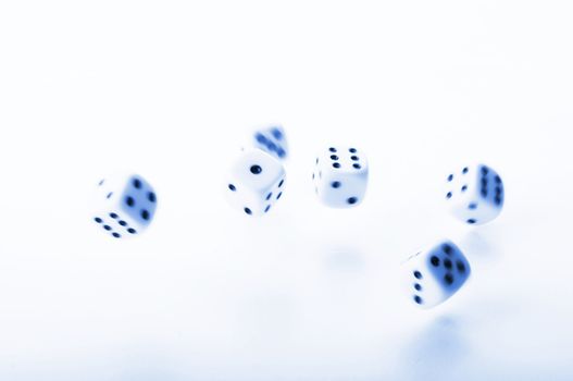 falling dice showing random fortune or casino concept